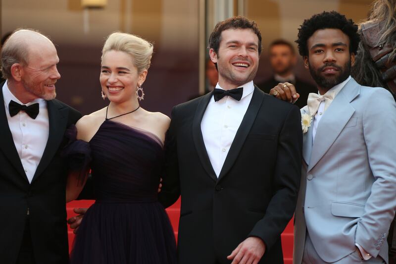 Director Ron Howard, from left, actors Emilia Clarke, Alden Ehrenreich and Donald Glover pose for photographers upon arrival at the premiere of the film 'Solo: A Star Wars Story' at the 71st international film festival, Cannes, southern France, Tuesday, M
