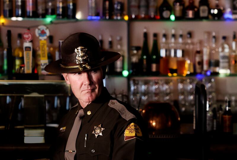 Utah Highway Patrol Maj.Steve Salas stands inside Bar X during a press conference urging drivers to add a sober ride to their winter holiday plans in Salt Lake City on Thursday, Dec. 14, 2023.