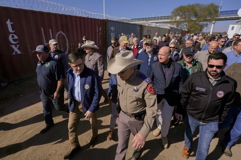 U.S. House Speaker Mike Johnson, center left, and a group of Republican members of Congress tour the Texas-Mexico border on Jan. 3, 2024, in Eagle Pass, Texas.