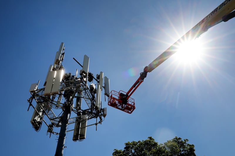 Workers from Sorensen Companies Inc. construct a 5G cell tower in Draper on Monday, Aug. 29, 2022. Intellectual property protections encourage innovation by fostering competition and thorough research. Without protections, American invention will suffer.
