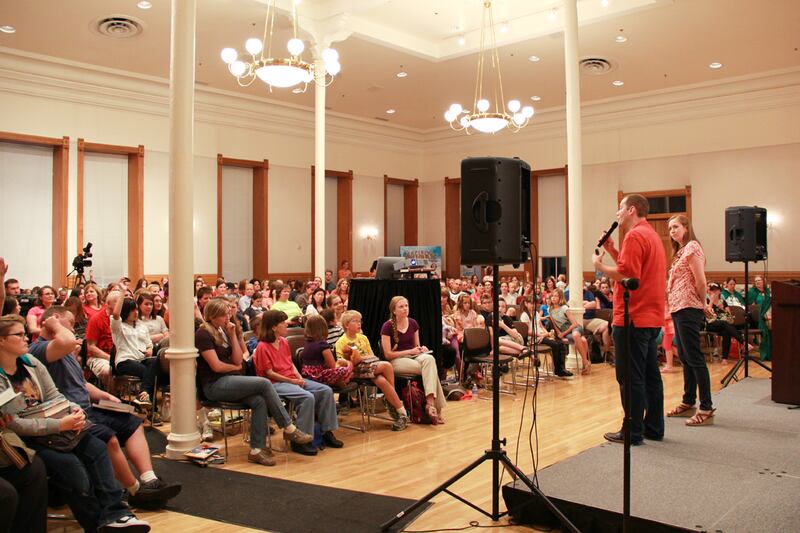 Authors Brandon Mull and Shannon Hale speak at a young adult event at the Provo City Library.