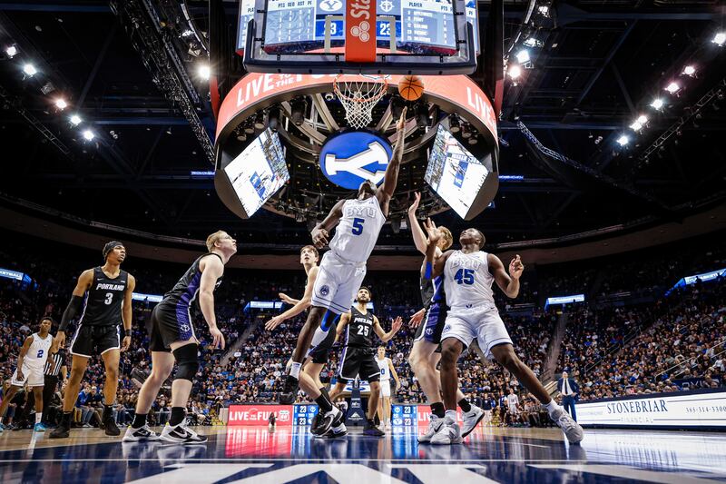 BYU’s Gideon George (5) shoots inside during the Cougars’ 71-58 win over Portland at the Marriott Center in Provo on Saturday, Dec. 31, 2022.