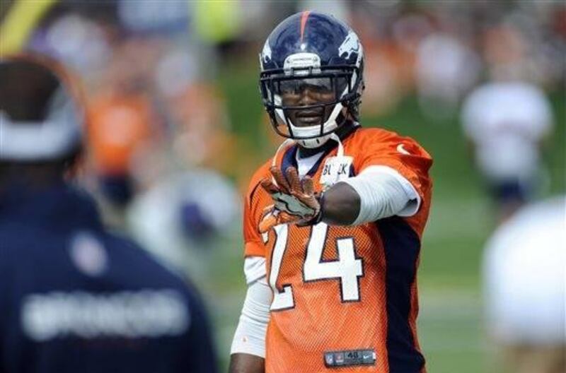 In this July 25, 2013, file photo, Denver Broncos cornerback Champ Bailey motions during NFL football training camp in Englewood, Colo. When a cornerback's career is reaching the end, the hints are subtle. People keep looking for signs that Bailey's caree
