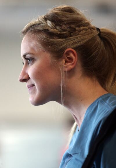 Kendal Levine, who was hit by a car while on her mission in Australia, smiles while looking in a full-length mirror during a physical therapy session at Neuroworx in Sandy on Thursday, April 25, 2019.