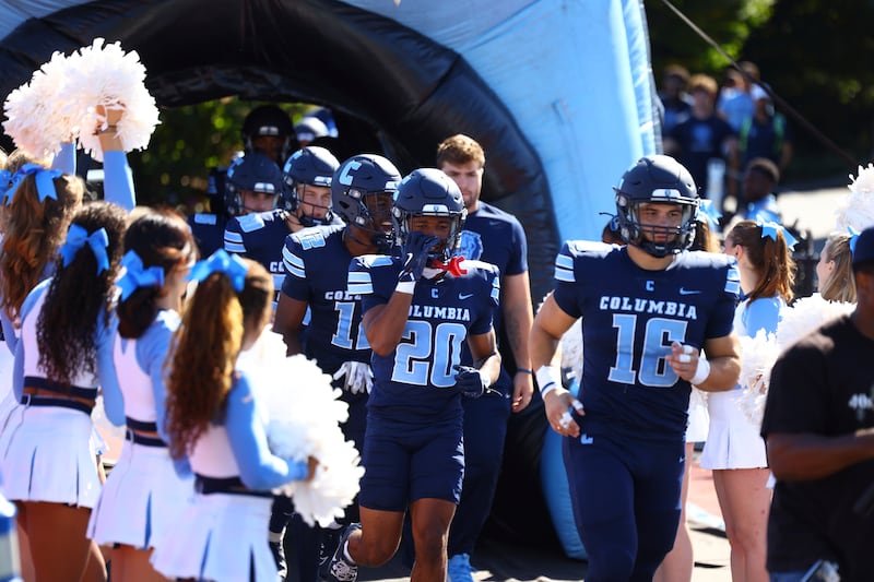 Columbia Lions players head out onto the field before the start of the NCAA football game against the Princeton Tigers at Robert K. Kraft Field at Lawrence A. Wien Stadium in New York, N.Y., on October 5, 2024.