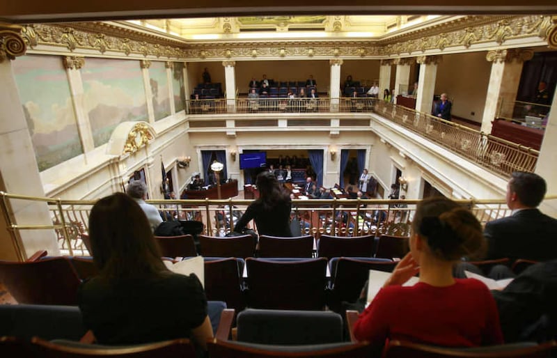 Spectators watch from the gallery on the Senate chambers during the opening day of the Utah State Legislature Monday, Jan. 23, 2012 in the Utah State Capitol. On Friday, a Senate committee voted a bill that would ban teens from using cellphones while driv