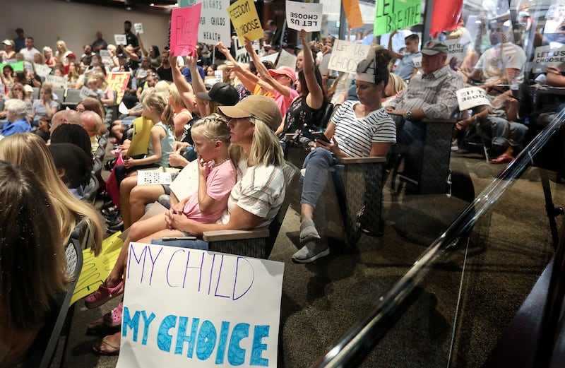 A crowd of people at a Salt Lake County Council meeting, in which a K-6 mask order was overturned.