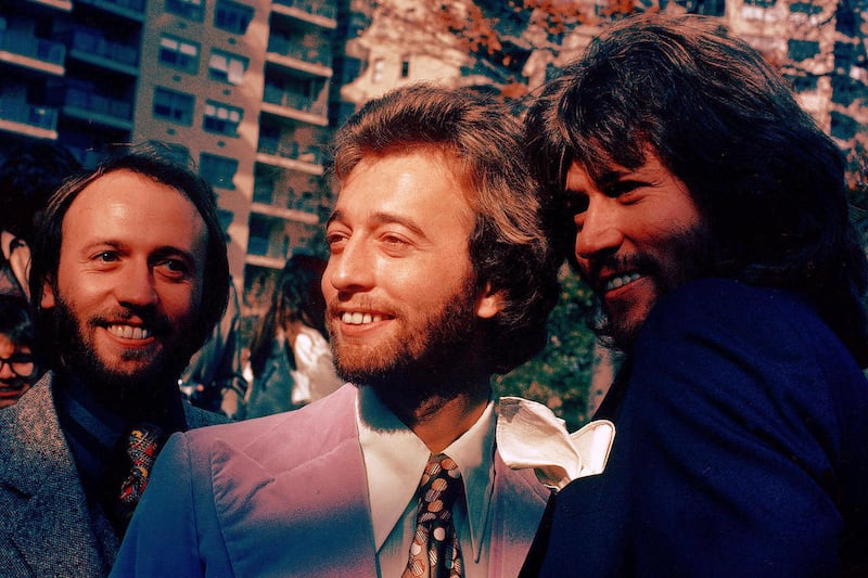 FILE- In this undated file photo, from left, members of The Bee Gees Musical Group, Maurice Gibb, Robin Gibb, Barry Gibb pose for a photo. A representative said on Sunday, May 20, 2012, that Robin Gibb died at the age of 62. (AP Photo)