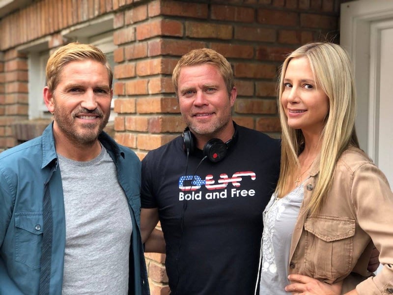 Actor Jim Caviezel, left, stands with Operation Underground Railroad founder/CEO Timothy Ballard and actor Mira Sorvino, right, in Colombia on the set of a feature film about the founding of Operation Underground Railroad.
