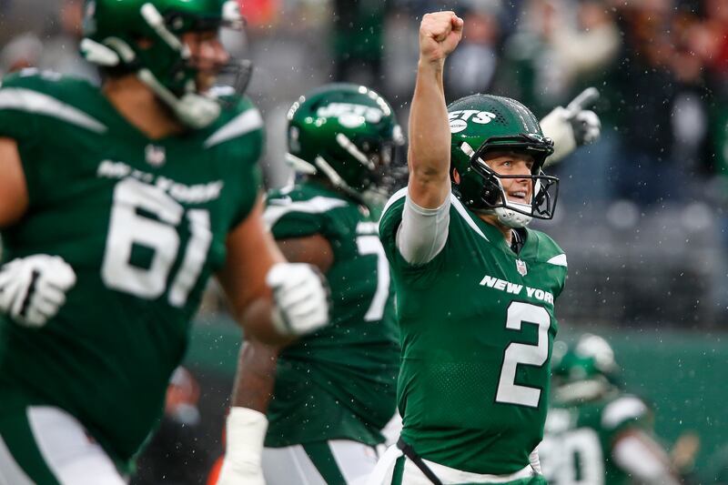 New York Jets quarterback Zach Wilson (2) celebrates after a touchdown against the Houston Texans during the second half of an NFL football game, Sunday, Dec. 10, 2023, in East Rutherford, N.J. (AP Photo/John Munson)