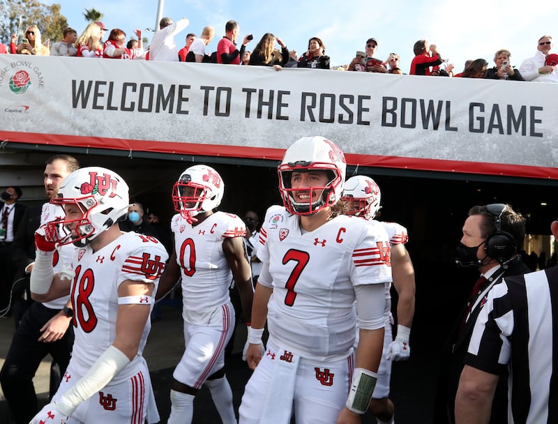 The Utah football team walks onto the field on Jan. 1, 2022, for the game against Ohio State in the Rose Bowl in Pasadena, Calif.