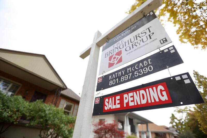A “for sale” sign and “sale pending” are pictured in Salt Lake City on Monday, Oct. 18, 2021.