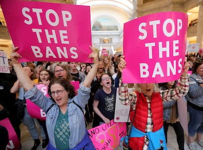 Rosalie Winard, Kaylee Crump and Jill Sheinberg cheer during a rally against abortion bans as part of Stop the Bans Day of Action at the Capitol in Salt Lake City on Tuesday, May 21, 2019.