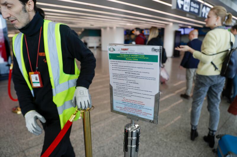 A notice explaining precautions to be taken by people traveling to Wuhan, China, is seen at a terminal of Rome’s International Fiumicino airport, Tuesday, Jan. 21, 2020. Heightened precautions are being taken worldwide as a new strain of coronavirus has been infecting hundreds of people across the central Chinese metropolis.