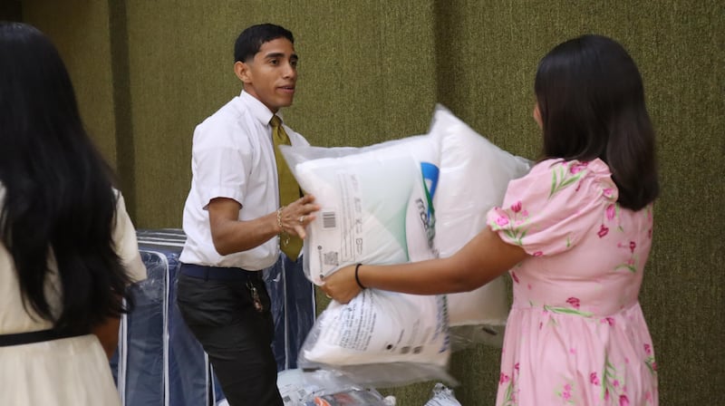 Volunteers and missionaries from The Church of Jesus Christ of Latter-day Saints prepare items for those affected by twin earthquakes in Venezuela on Saturday, June 27, 2026.