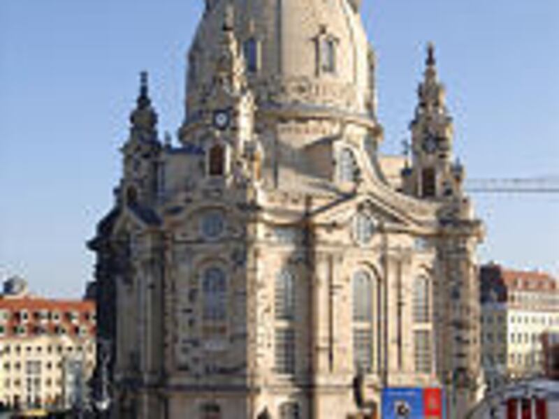 A throng gathers on the Neumarkt place before the beginning of a special service to rededicate the Frauenkirche cathedral in Dresden, which was destroyed 60 years ago.