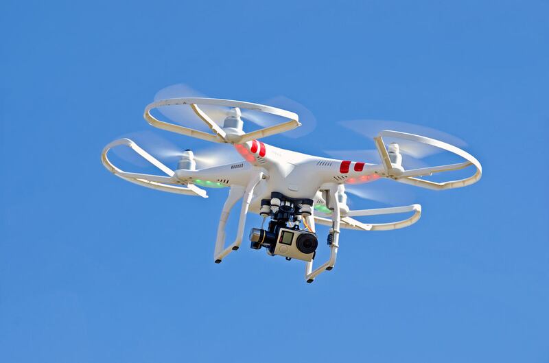 Two people have been charged with using a drone to peep inside the windows of Orem residents.