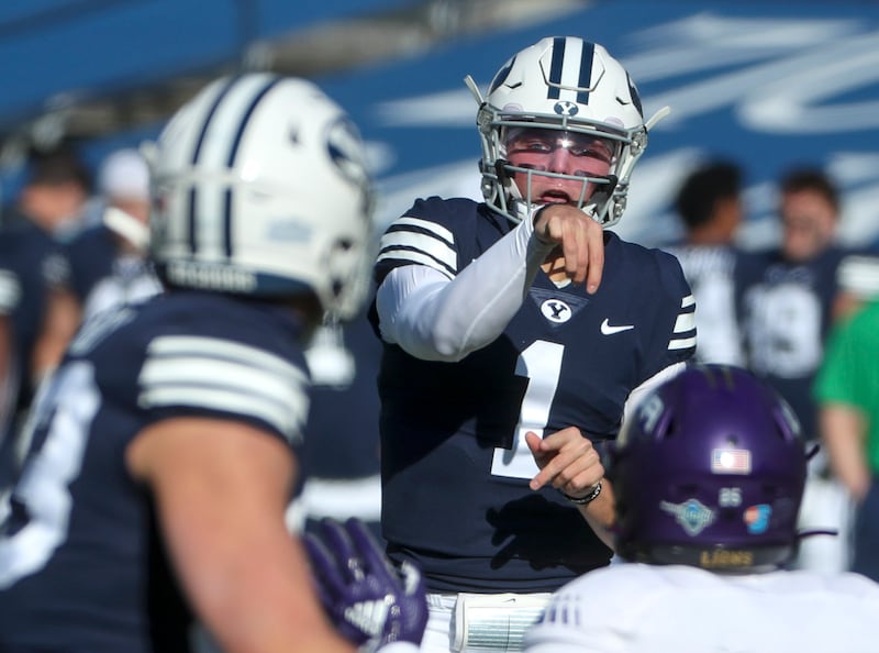 BYU quarterback Zach Wilson flips a pass over the North Alabama defense during a game in Provo on Saturday, Nov. 21, 2020.