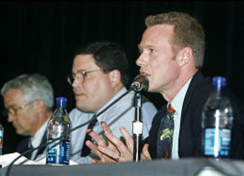 At BYU, Ralph Hancock, left, Scott Cooper and Darrin Hawkins discuss Vice President Cheney and the war on terror.