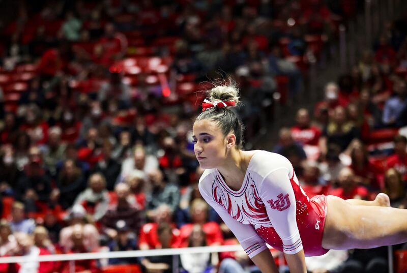 Utah’s Amelie Morgan competes on balance beam against Minnesota.