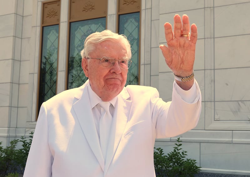 President M. Russell Ballard waves outside the Columbus Ohio Temple between rededication sessions on June 4, 2023.