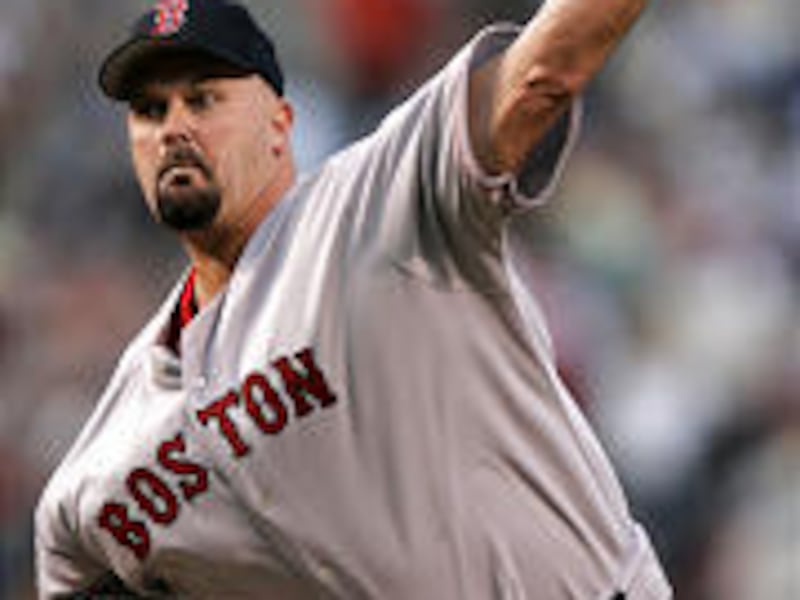 Boston Red Sox pitcher David Wells delivers a pitch during the first inning against the Baltimore Orioles