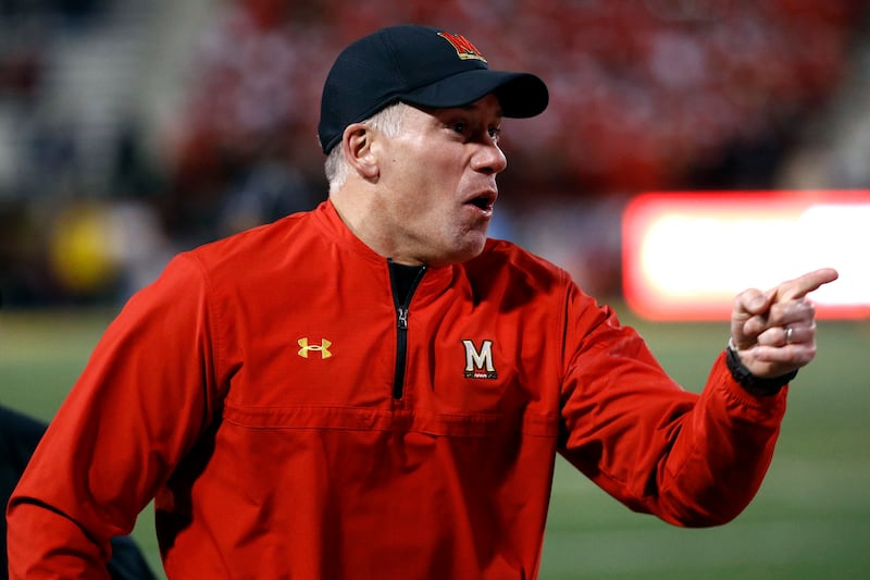 Maryland head coach DJ Durkin yells at an official in the second half of an NCAA college football game against Michigan in College Park, Md., Saturday, Nov. 11, 2017. (AP Photo/Patrick Semansky)