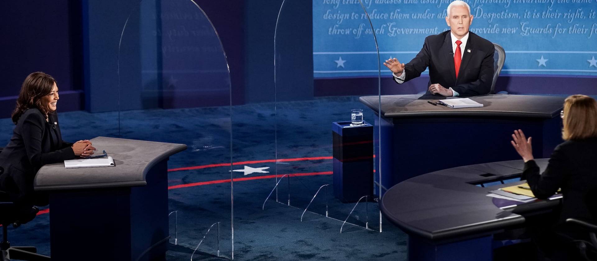 Moderator Susan Page tries to reign in Vice President Mike Pence as he talks past his allotted time during his debate against Democratic challenger Sen. Kamala Harris, D-Calif., in the vice presidential debate at Kingsbury Hall at the University of Utah in Salt Lake City on Wednesday, Oct. 7, 2020.