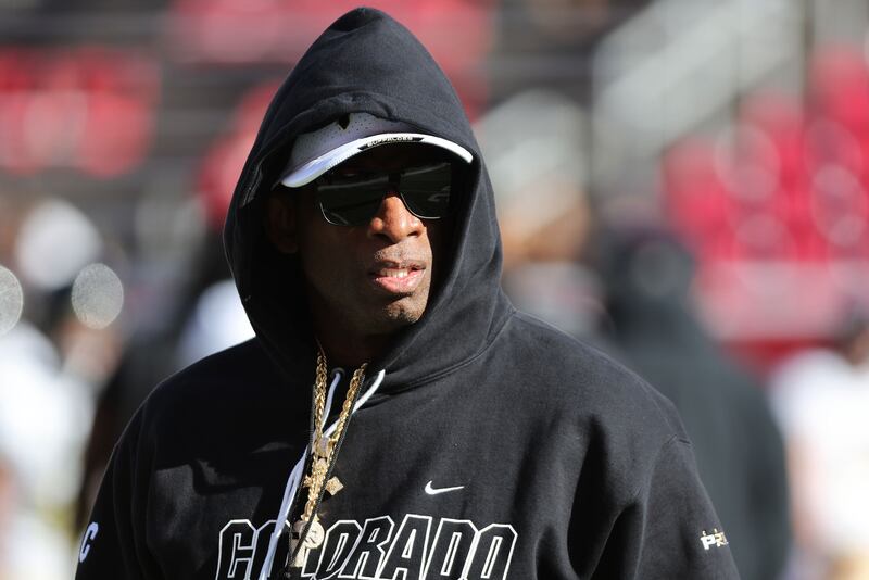 Colorado Buffaloes head coach Deion Sanders watches warmups in Salt Lake City on Saturday, Nov. 25, 2023.