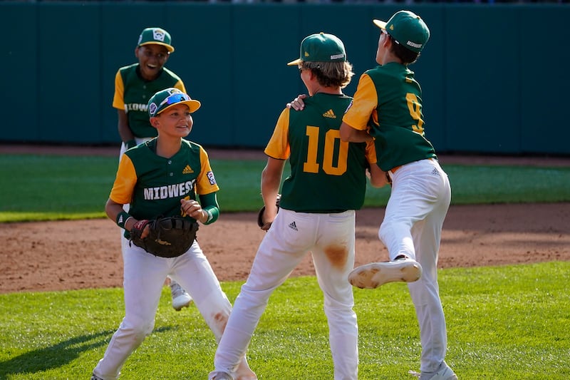 Little Leaguers from Davenport, Iowa, celebrate after a 6-3 win over Bonney Lake, Wash., in the Little League World Series.