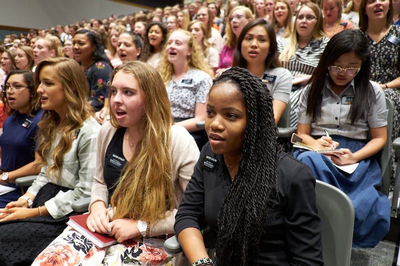 FILE - Missionaries sing a hymn during a MTC devotional address by Elder Quentin L. Cook held as part of 2018 Mission Leadership Seminar on Sunday, June 24, 2018, which was broadcast around the world to the Church’s 14 missionary training centers.