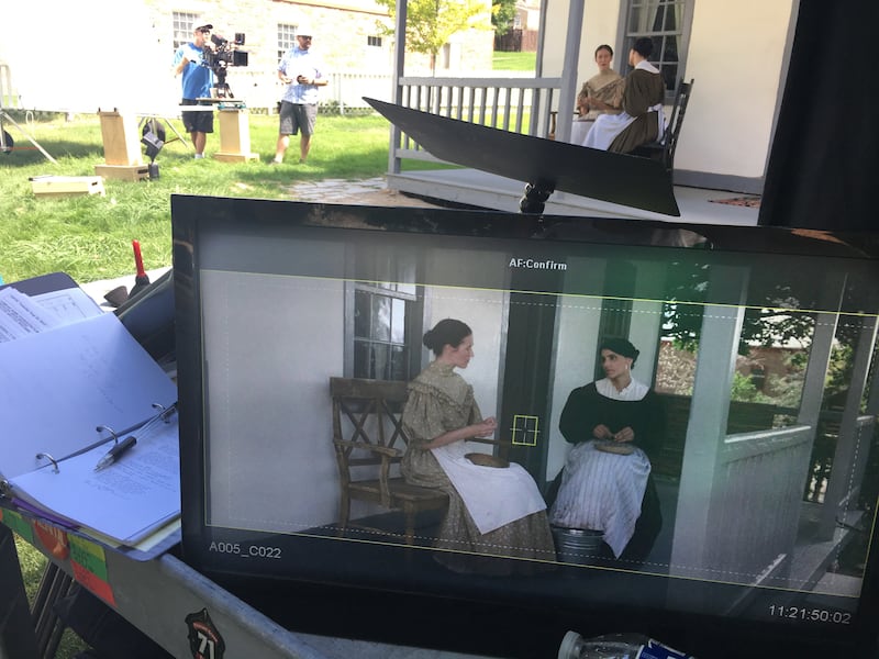 Behind the scenes during the filming of "In Emma's Footsteps."