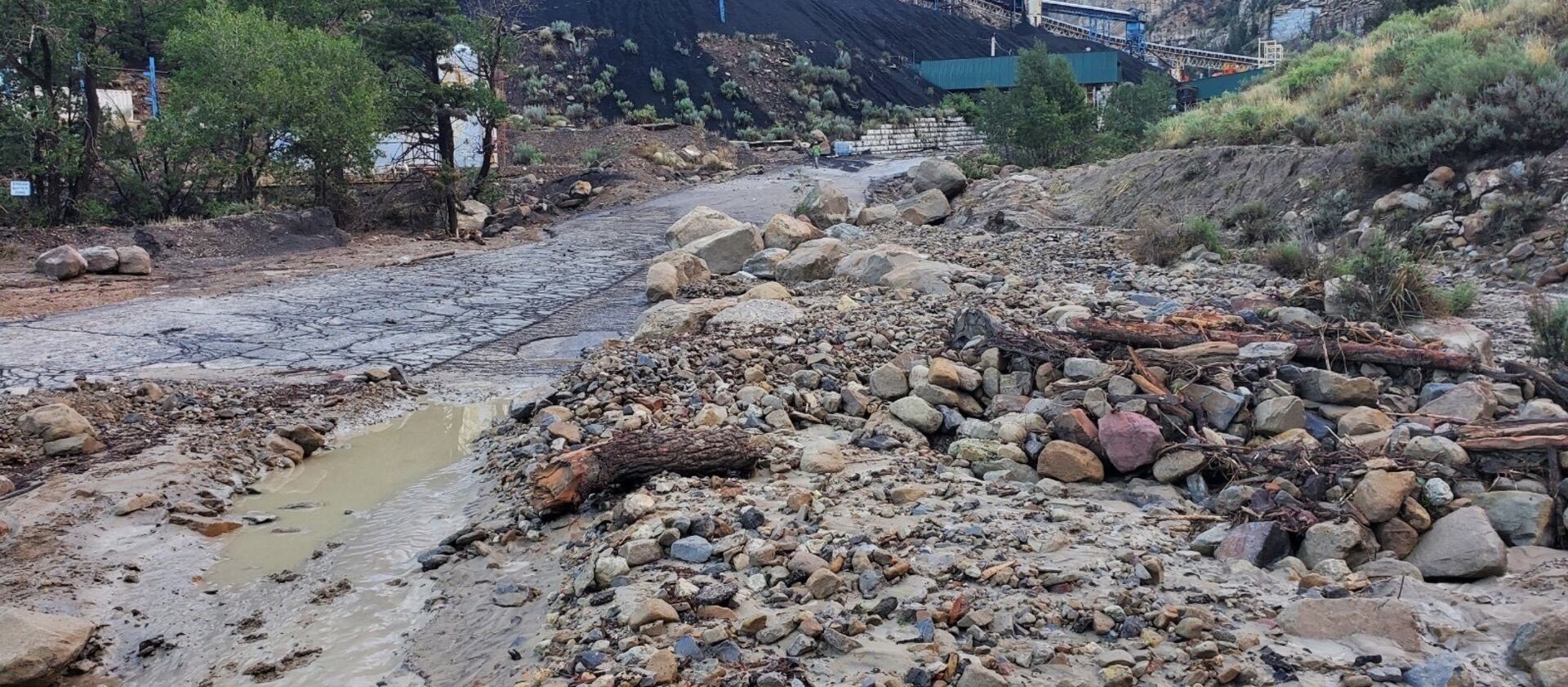 Emery County crews clean up after a flash flooding event near the Gentry Mountain Mine that killed one man on Sunday.