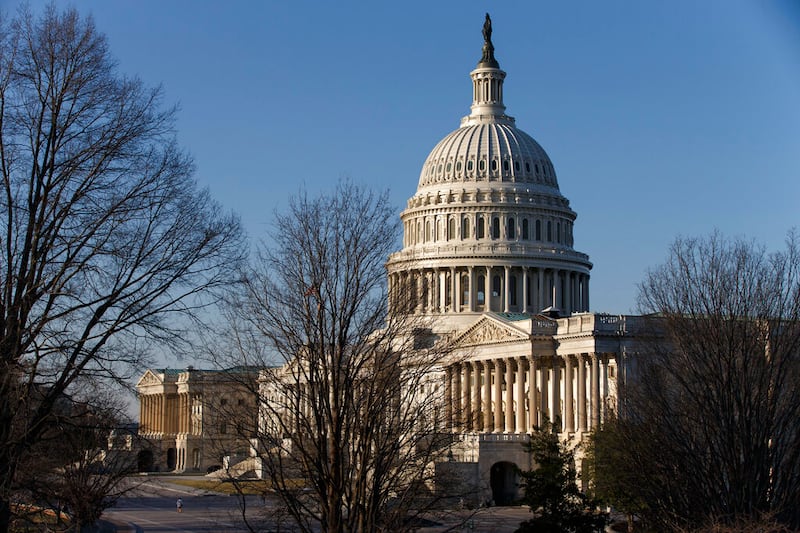The morning sun illuminates the Capitol in Washington.