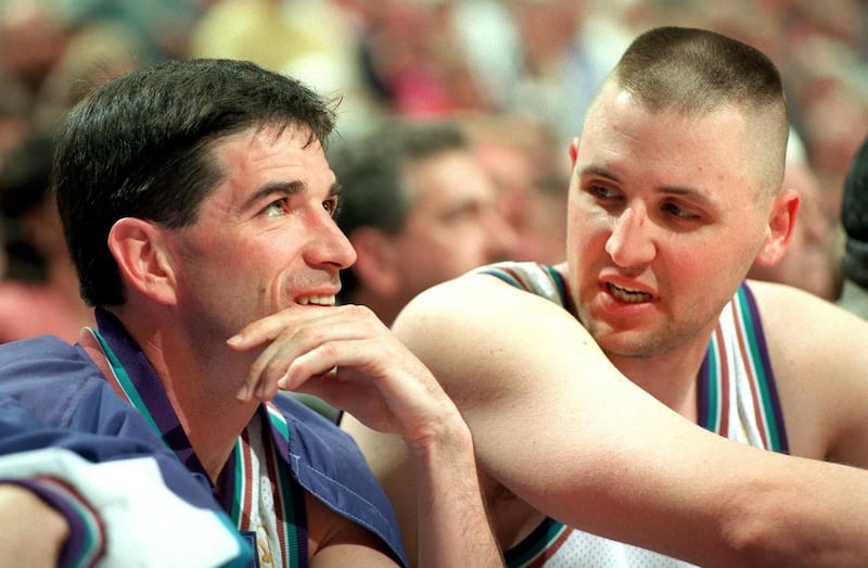 04.26.97 - John Stockton (left) and Greg Ostertag chat on the bench during game 2 of the Clippers series.