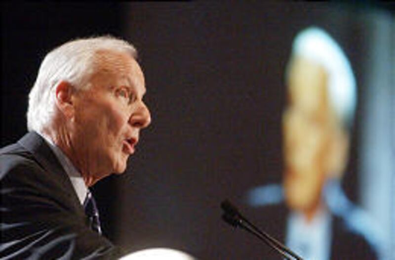 Delta Air Lines CEO Gerald Grinstein speaks at the beleaguered company's annual meeting of shareholders in Atlanta Friday.
