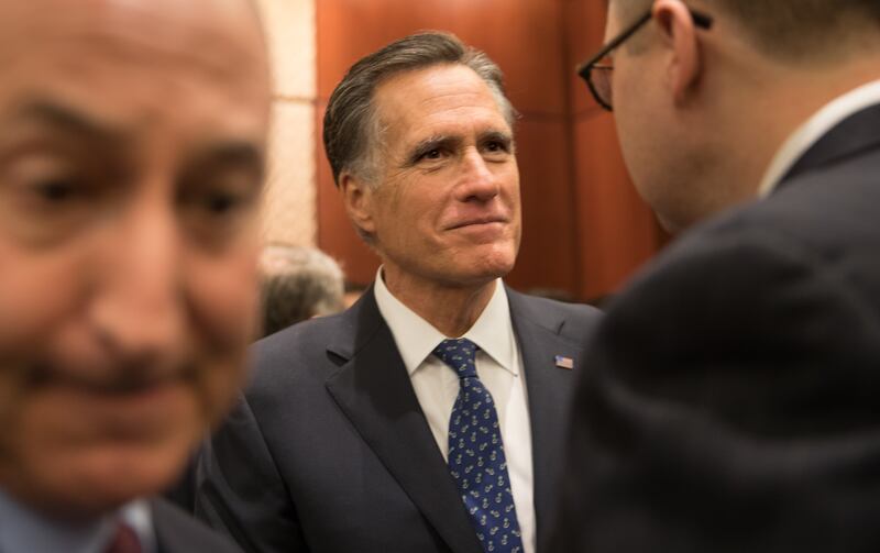 Senator-elect Mitt Romney, R-Utah, greets supporters and friends during a reception at the U.S. Capitol in Washington, D.C., on January 3, 2019.