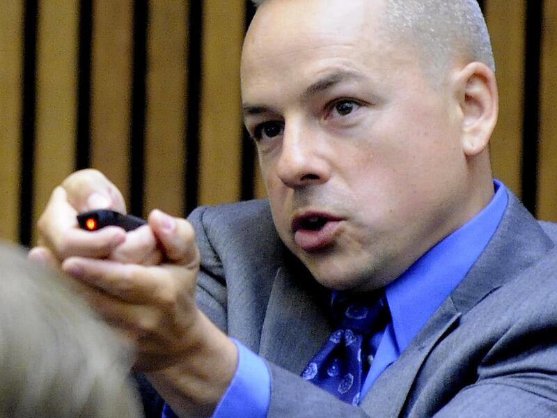 FILE - In this June 13, 2013 file photo Detroit Police Officer Joseph Weekley testifies during his first trial in Wayne County Circuit Court in Detroit, Mich. Weekley is charged in a second trial with involuntary manslaughter in the death of Aiyana Stanl