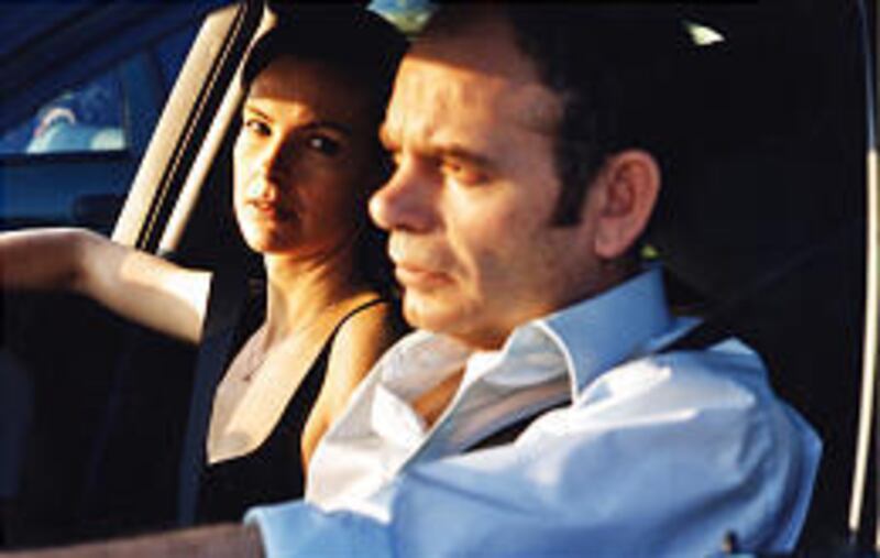 Carole Bouquet as Helene and Jean-Pierre Darroussin as Antoine play a middle-age couple in the French film "Feux Rouges (Red Lights)."