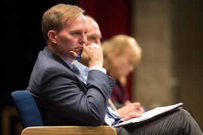 Salt Lake County Mayor Ben McAdams listens to residents voice their concern about the Olympia Hills development proposal at a town hall in Herriman High School on Thursday, June 14, 2018. Many members of the community are concerned about the high density