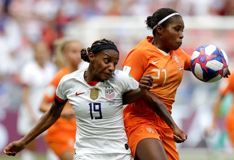 United States’ Crystal Dunn, left, challenges Netherlands’ Lineth Beerensteyn during the Women’s World Cup final, July 7, 2019.