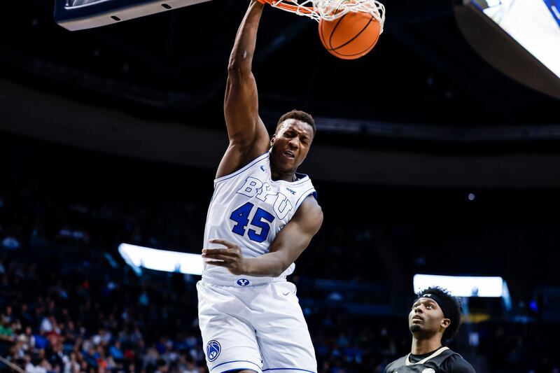 BYU’s Fousseyni Traore (45) dunks the ball during the Cougars’ 90-61 win over Lindenwood on Tuesday, Dec. 20, 2022, at the Marriott Center.