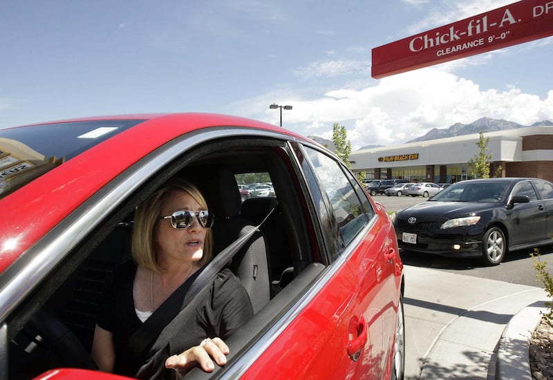 A Chick-fil-A customer gets ready to order lunch.