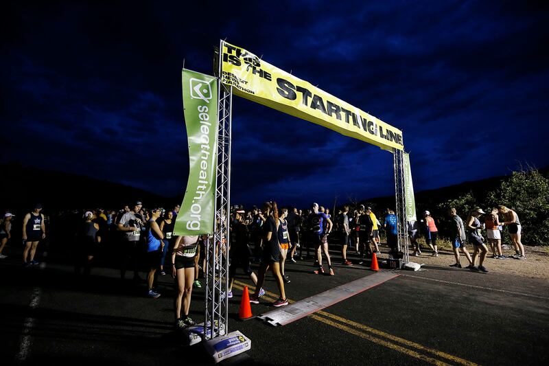 Runners gather for the start of the Deseret News half marathon on Wednesday, July 24, 2019, in Salt Lake City.