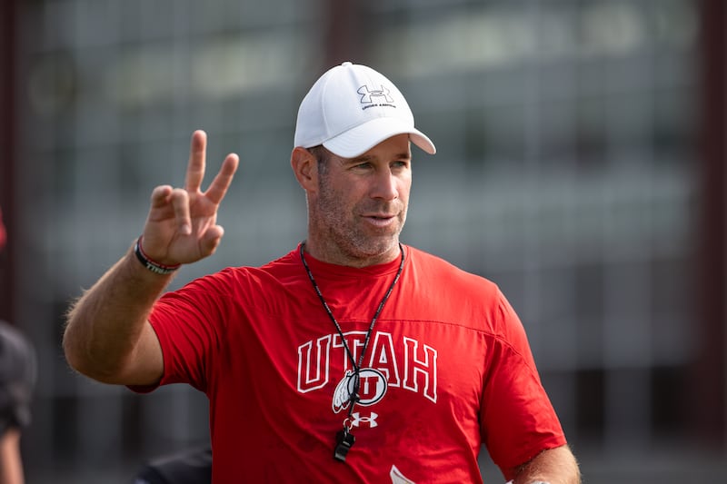 Utah defensive coordinator Morgan Scalley coaches up the defense during fall camp at the University of Utah in Salt Lake City.