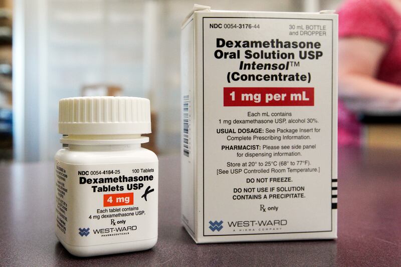 This Tuesday, June 16, 2020 file photo shows a bottle and box for dexamethasone in a pharmacy in Omaha, Neb. New studies confirm that cheap steroid drugs improved survival for severely ill COVID-19 patients, cementing this as a standard of care and expanding options to more types than this one previously shown to help.