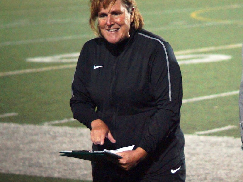 Wasatch girl's head soccer coach Gretchen Zigante goes over adjustments at halftime during the Wasps season finale last week vs Maple Mountain.