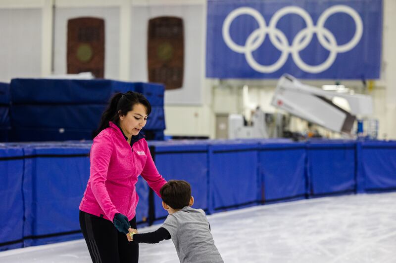 Jessica Mora conducts a skating lesson with Maximo Villasenor, 7, at the Utah Olympic Oval in Kearns on June 16, 2023.