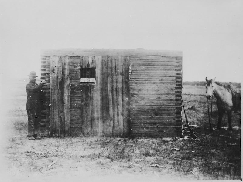 Wooden jailhouse in Wyoming Territory, 1893.
