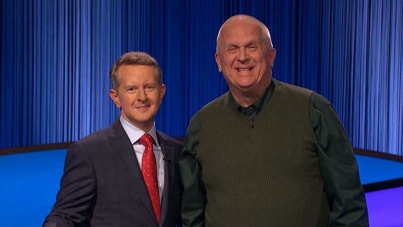 “Jeopardy!” host Ken Jennings, left, stands with contestant Tom Zulewski, who is from Washington, Utah.
